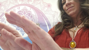 sheila cook giving reiki treatment