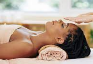 woman receiving a reiki session